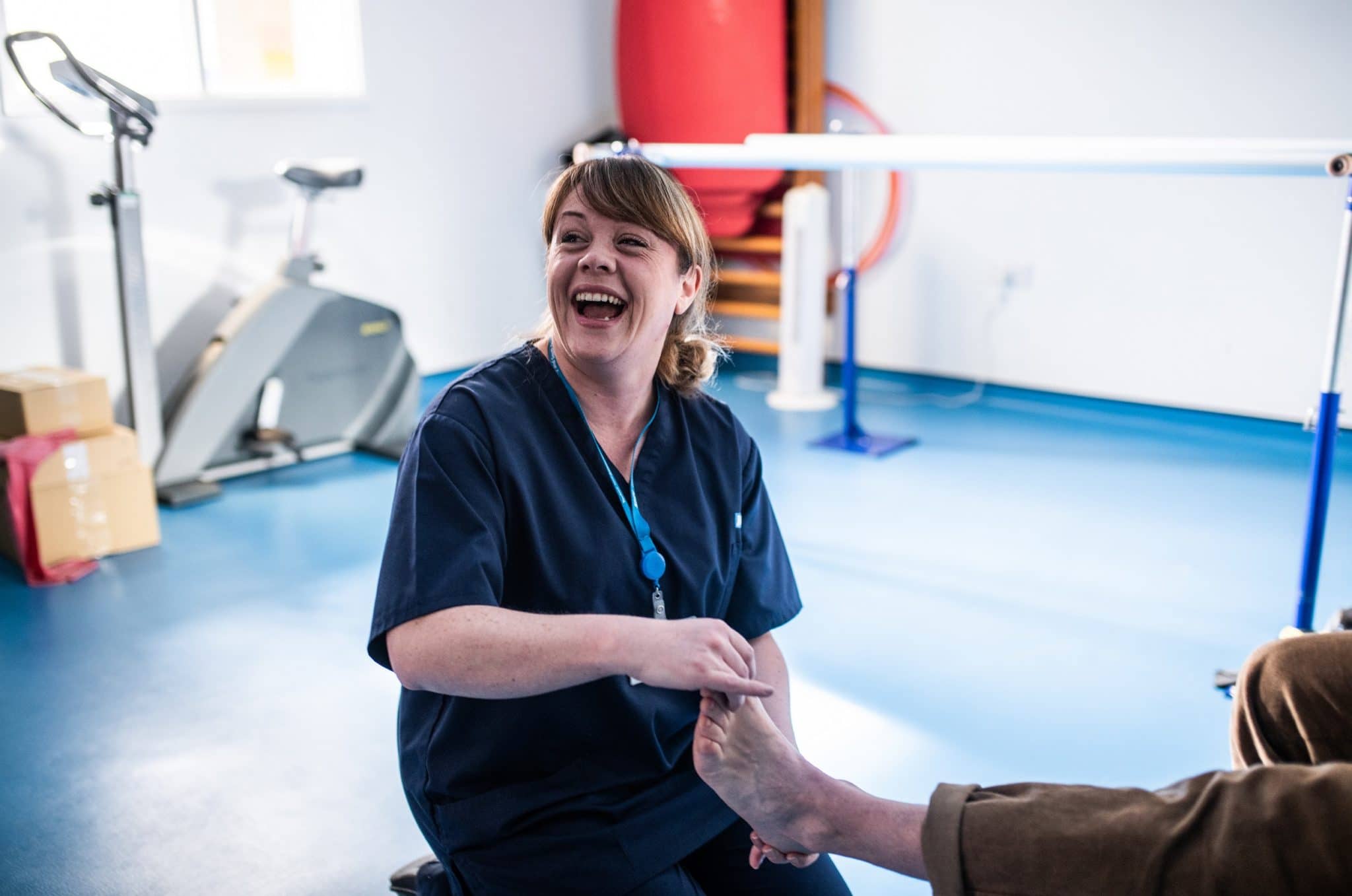 Podiatrist treating a patients feet