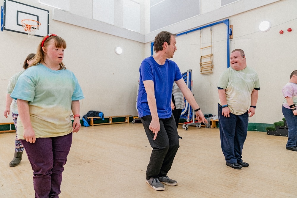 Support worker Ric in a street dance class with the students that he helps.