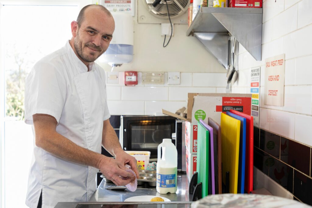 A cook working in a kitchen