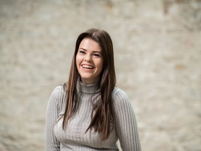 Social Worker, Kirsty, smiling at the camera