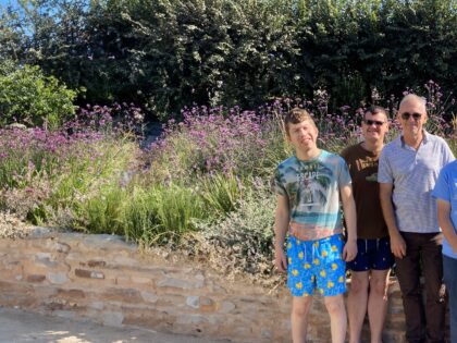 Group of 4 people in a garden